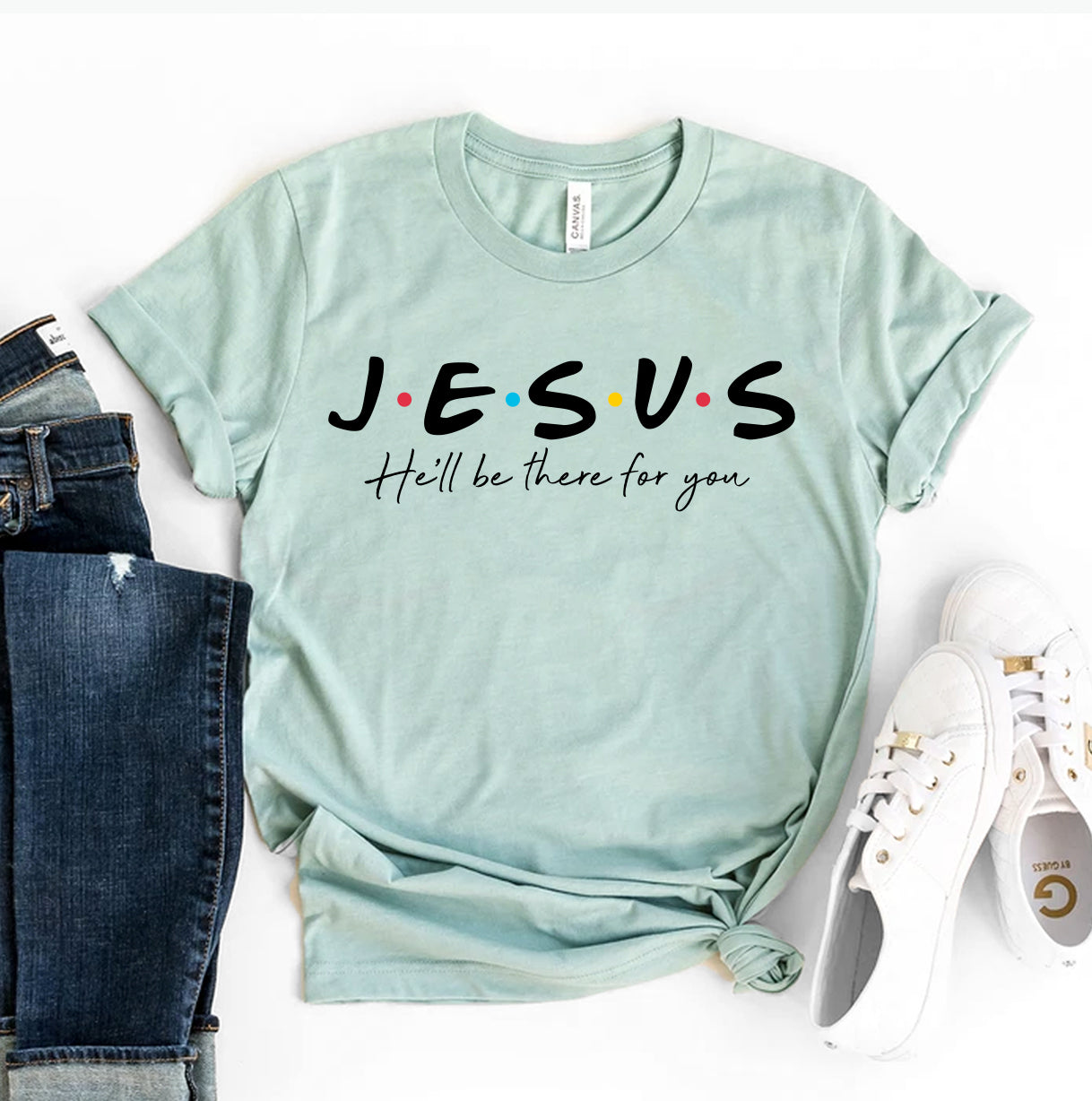 Light blue t-shirt with 'Jesus, He'll be there for you' text on a white background