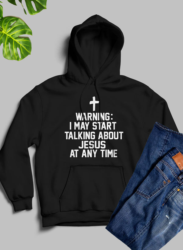 Black hoodie with text and a cross on a gray background