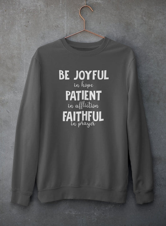 Gray sweatshirt with motivational text on a gray background